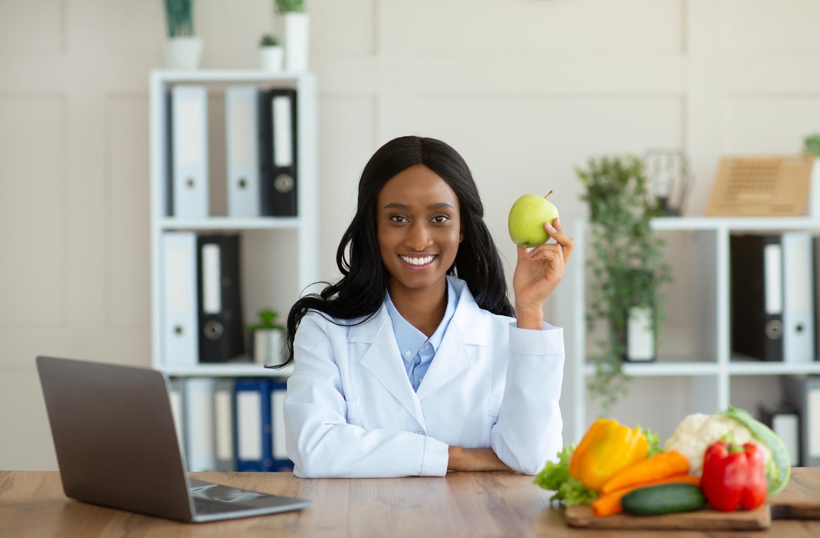 african-american-female-dietitian-holding-apple-an-2025-03-18-18-20-56-utc.jpg african-american-female-dietitian-holding-apple-an-2025-03-18-18-20-56-utc.jpg